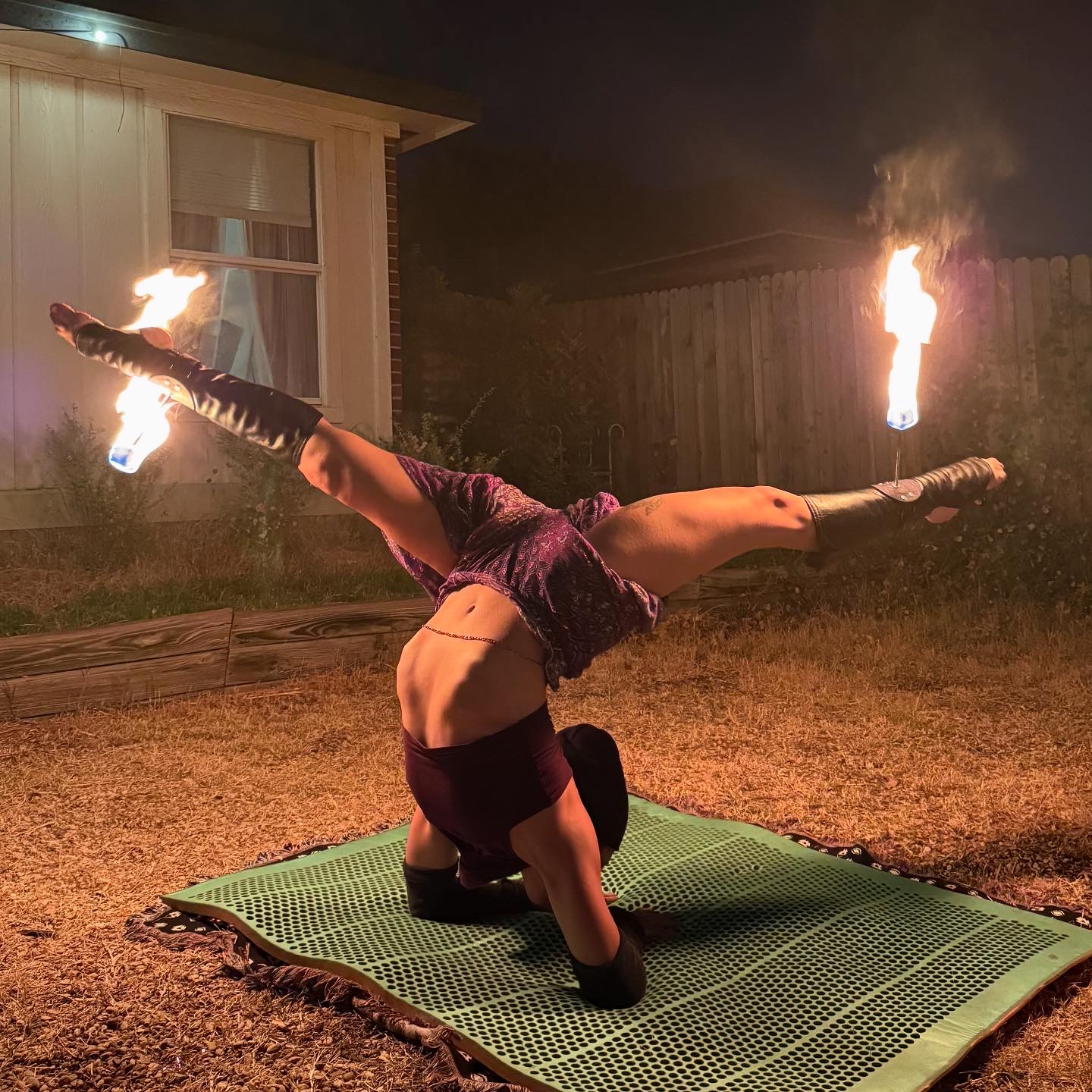 Darya Devotion fire spinning performance with fire hoops in Austin Texas